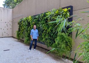 Sheldon near Live Wall (The Big Three: Metal Fabrication Lighting and Irrigation in Plant Walls)