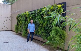 Sheldon near Live Wall (The Big Three: Metal Fabrication Lighting and Irrigation in Plant Walls)