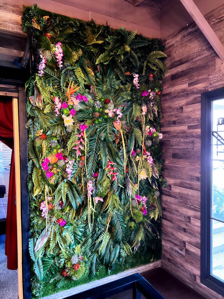 Tropical faux plants for restaurant entrance