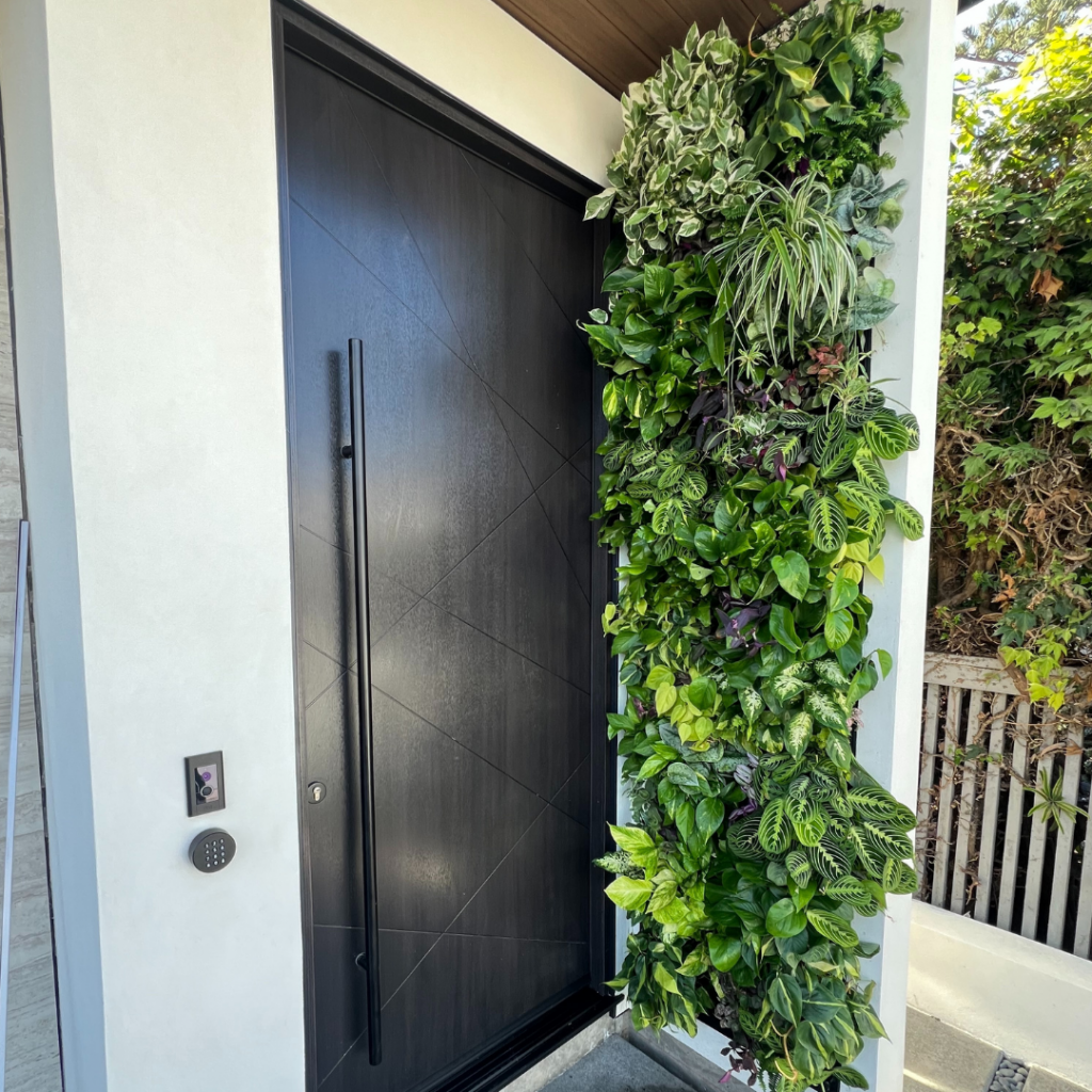 Custom, fully-integrated living wall for entryway in La Jolla residence